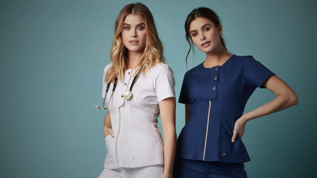 Two healthcare professionals standing in style wearing medical scrubs pants